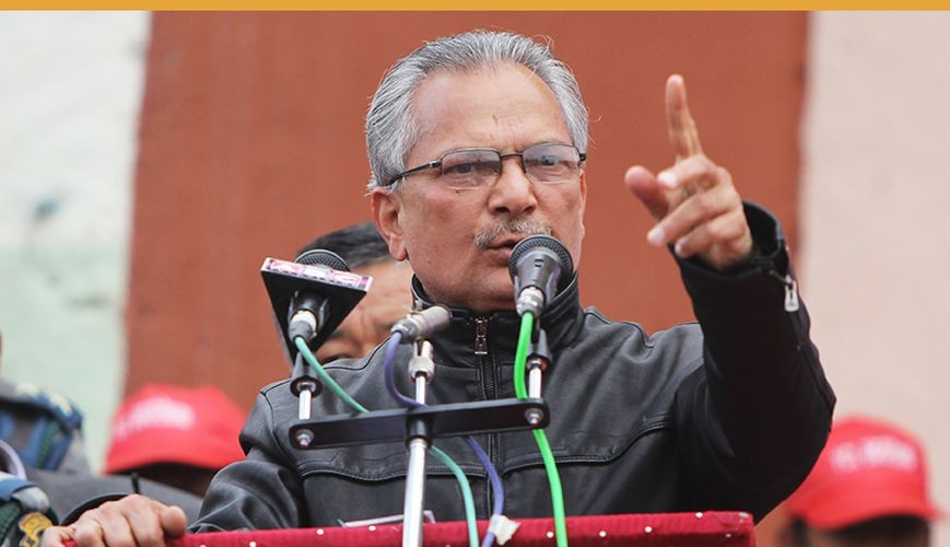 लोकतन्त्र दिवसमा बयलगाडे ओली धरहरा चढेर बदाम खाएर घाम ताप्दै  -  डा. बाबुराम भट्टराई   